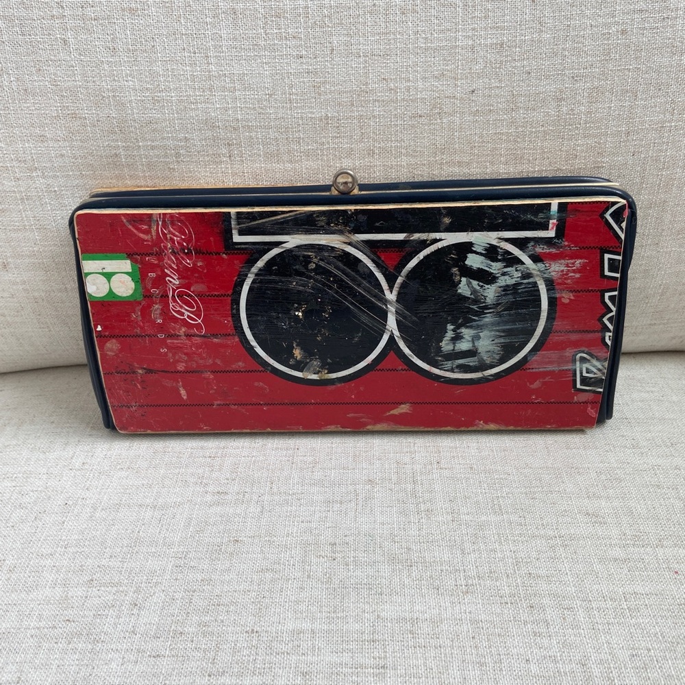 Handmade clutch bag made from old skateboard